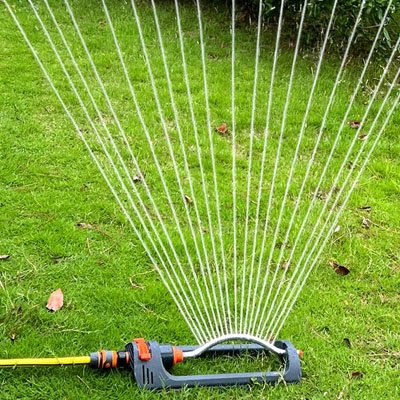 Arroseur oscillant irrigue pelouse