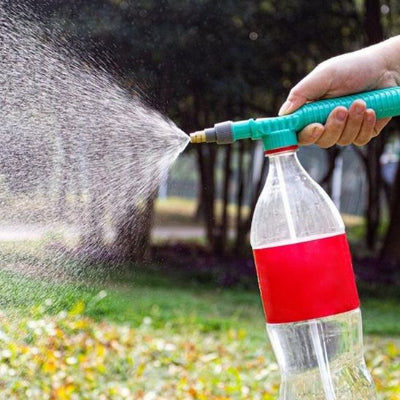 Pulvérisateur vert avec bouteille
